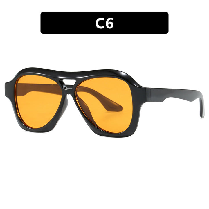 Dame moterik solbrille i innovativ design med bred ramme Skanto