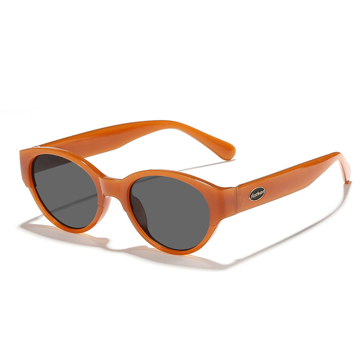Dame moteriktig solbrille med transparent ramme og ergonomisk design Skanto
