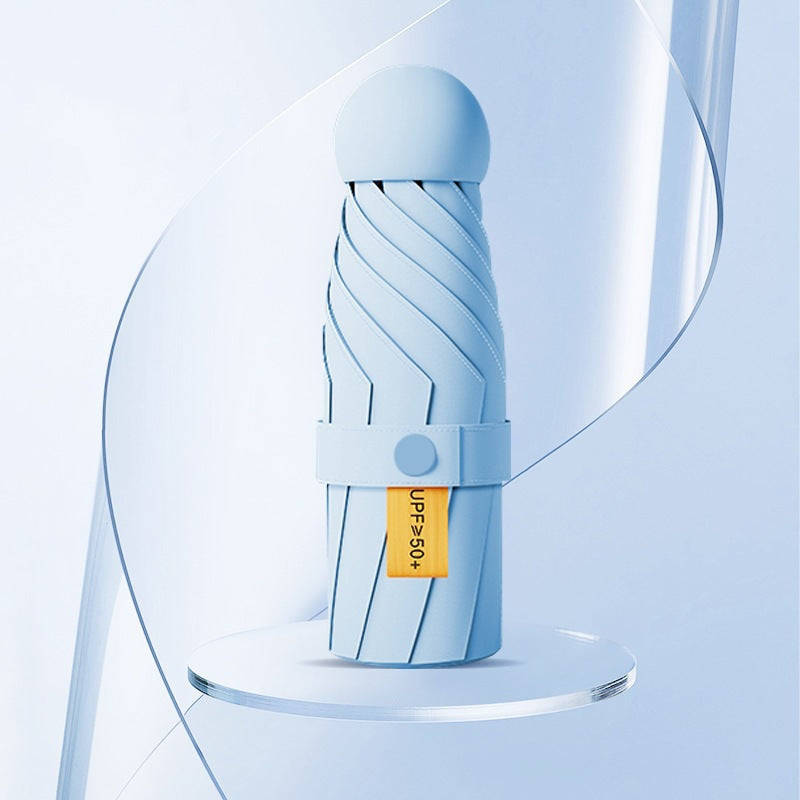 Damer UV-beskyttende sammenleggbar paraply med unikt design Skanto