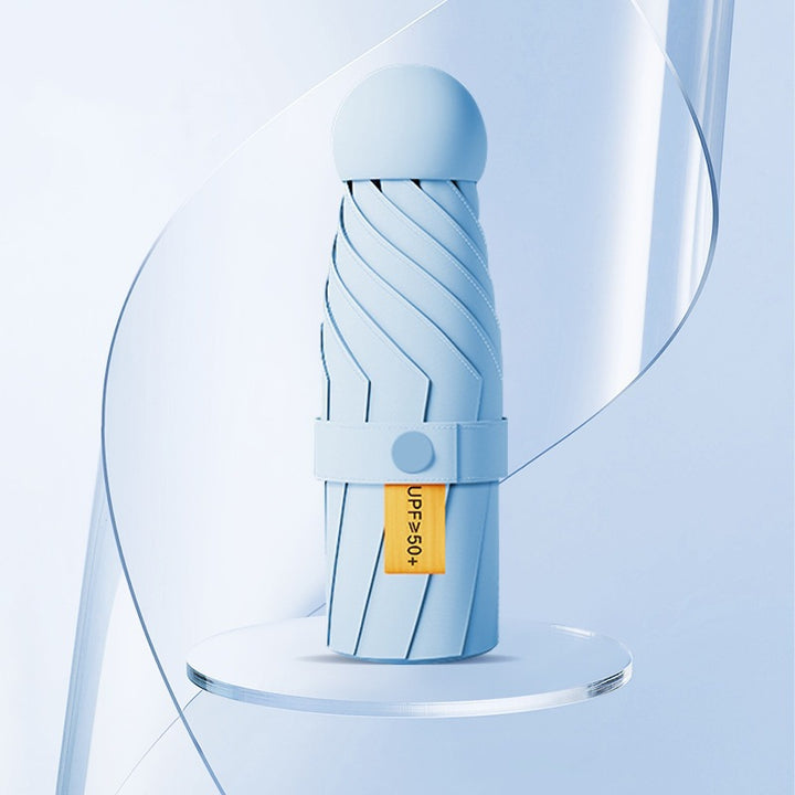 Damer UV-beskyttende sammenleggbar paraply med unikt design Skanto