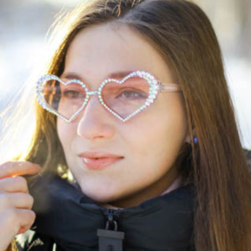 Dame hjerteformet solbrille med strassbesatt ramme Skanto