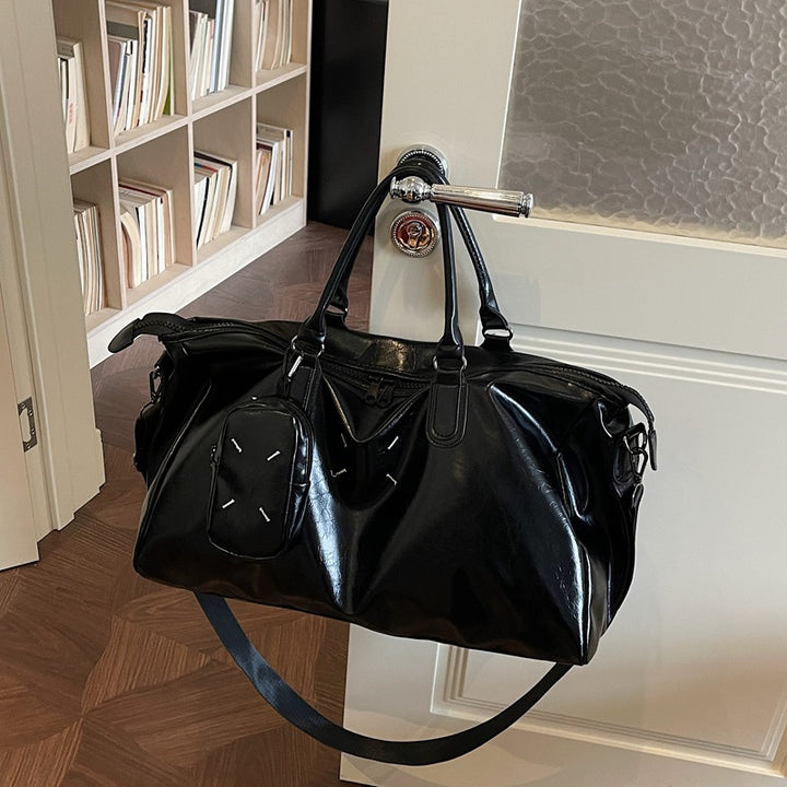 Elegant reiseveske i høykvalitets kunstlær Skanto