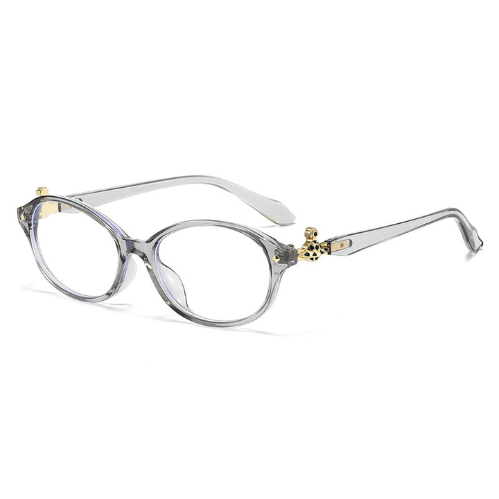 Dame motekunstig brille i elegant ova-design med gyldne aksenter Skanto