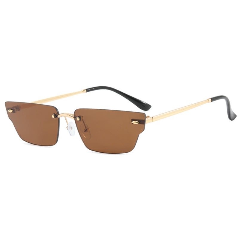 Dame geometrisk solbrille med filigranramme og transparente glass Skanto