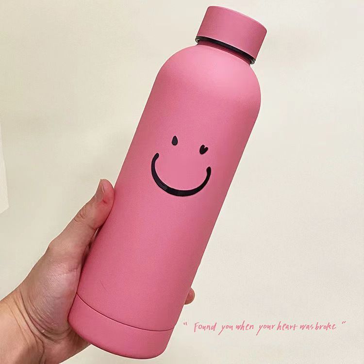 Dame isoleringsflaske med lyst smilendesign Skanto