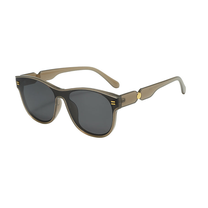 Dame moteriktig solbrille med unik ramme Skanto