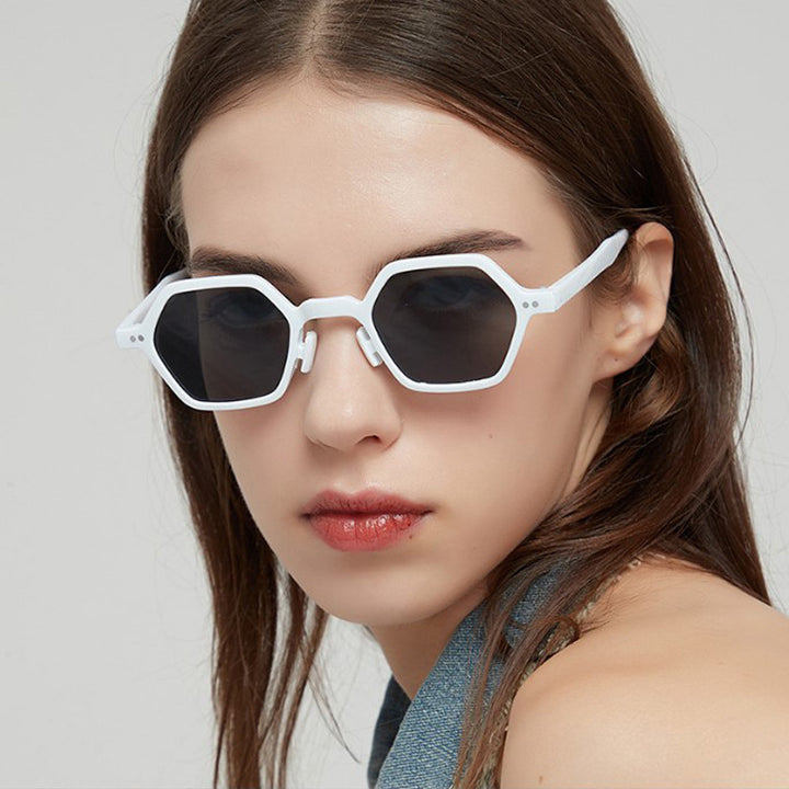 Dame sekskantet solbrille med gjennomsiktig ramme Skanto