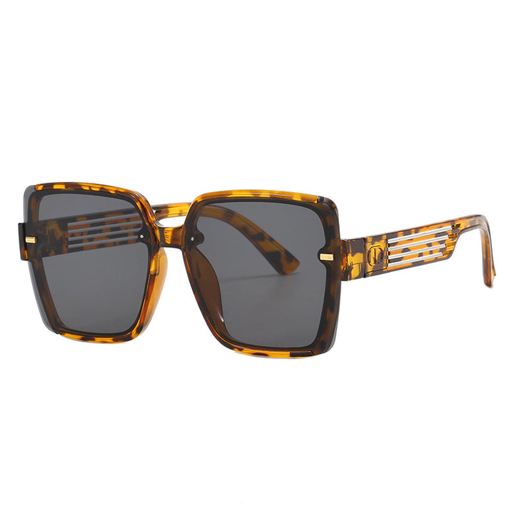 Dame firkantet solbrille med trendy geometrisk design Skanto