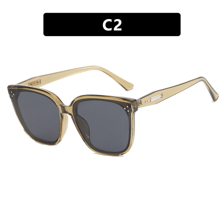 Dame moderne oversized solbrille med elegant, bred ramme Skanto