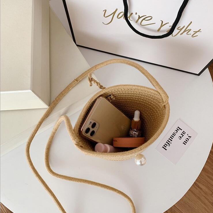 Elegant håndveske med perle-lås Skanto