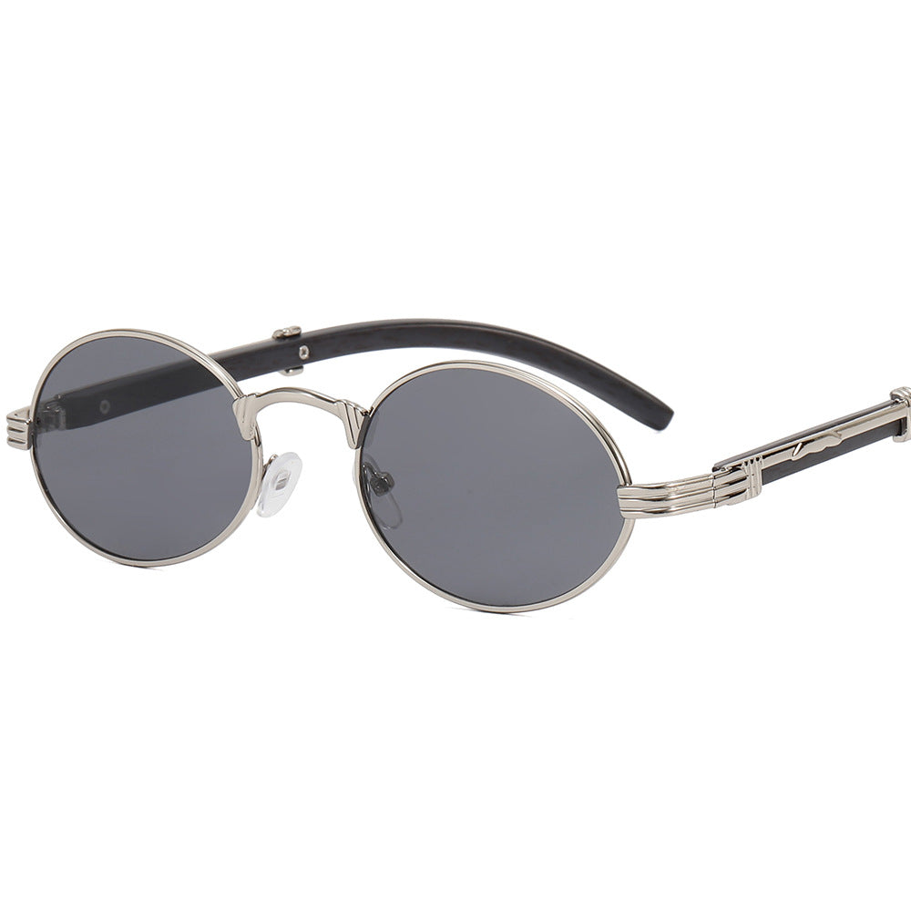 Dame rund designer solbrille med innovativ metallramme Skanto