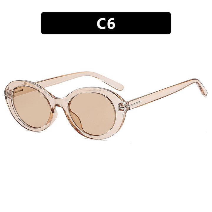 Dame moteriktig solbrille med innovativ oval ramme og UV-beskyttelse Skanto