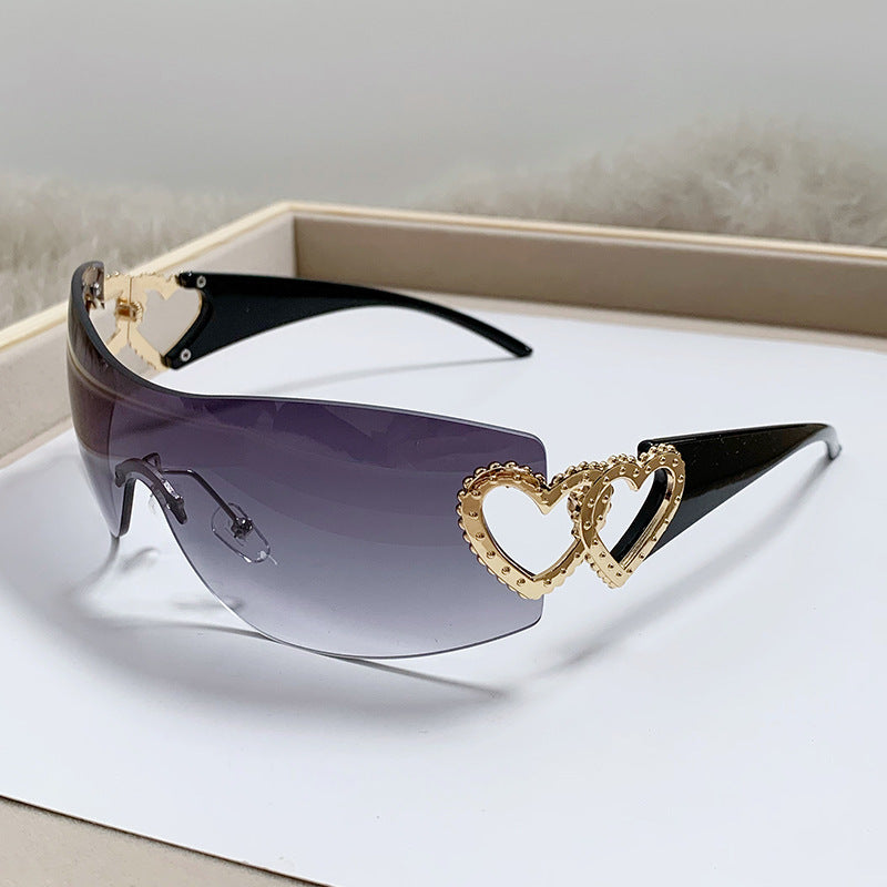Dame designer-solbrille med luksuriøs hjerte-akseent Skanto