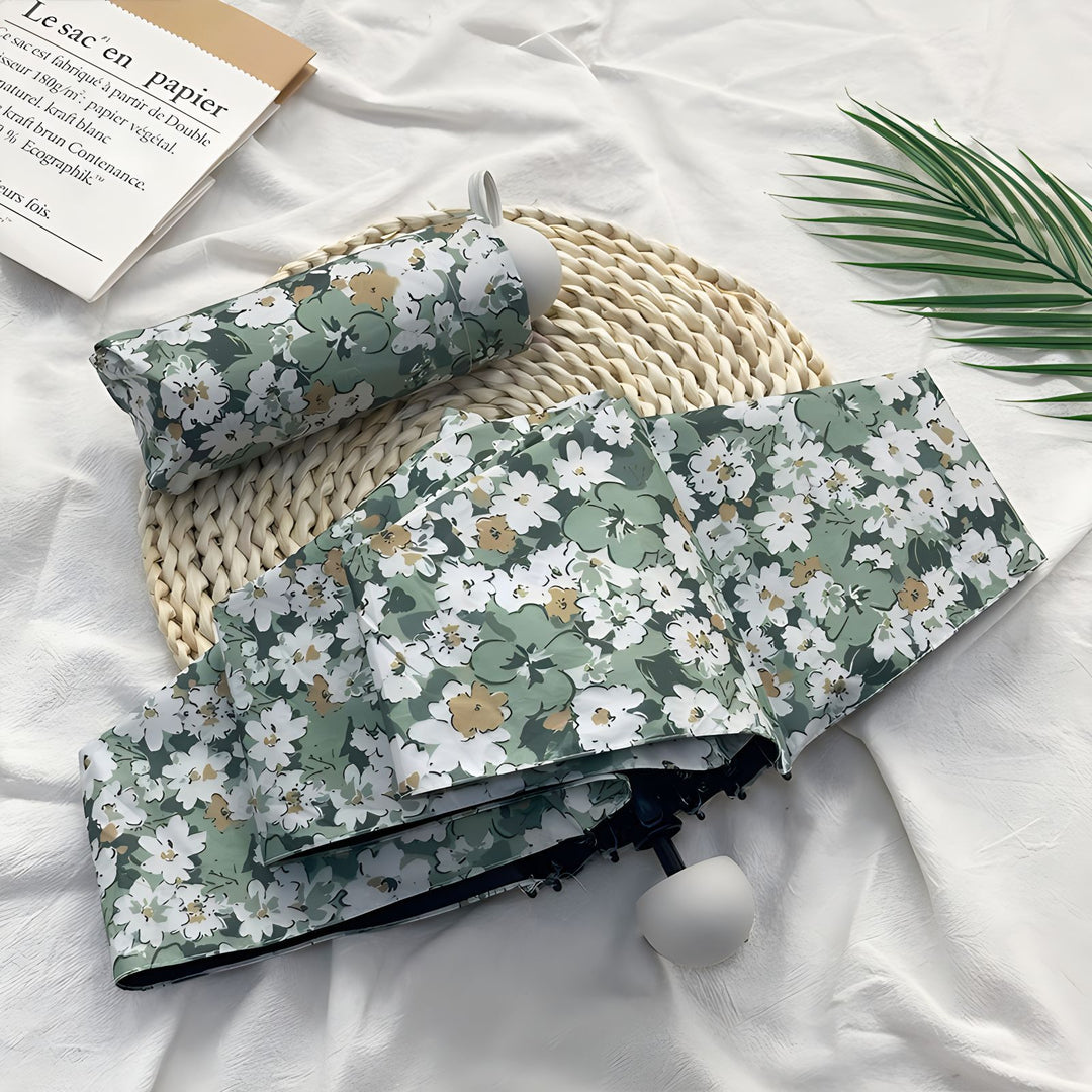 Damer Sammenleggbart paraply med elegant blomsterdesign Skanto