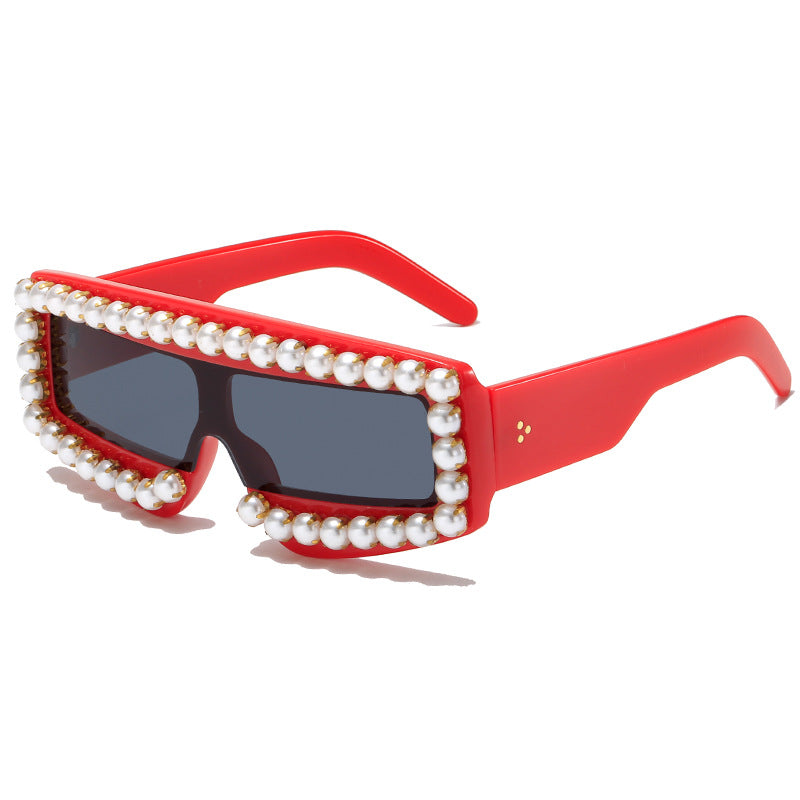 Dame moteriktig solbrille med perle-applikasjoner Skanto