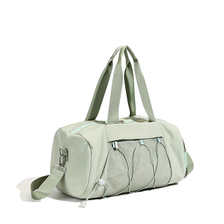 Damer sporty fritidsbærer med robust bærehåndtak og praktiske rom Skanto