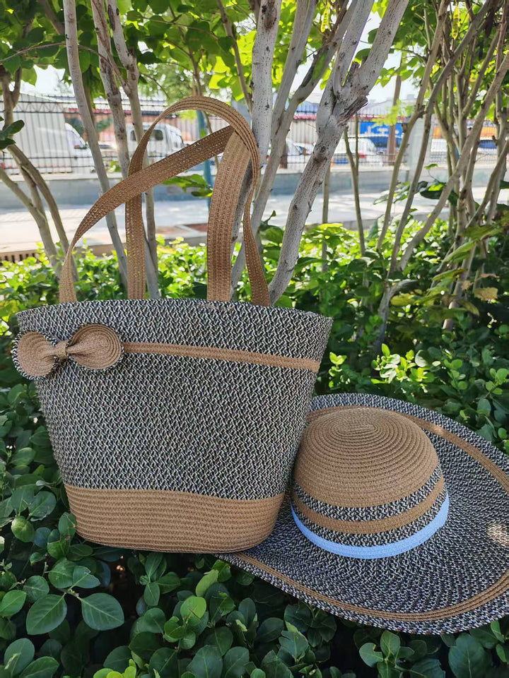 Elegante solhatt med bred brem og diskret stripemønster Skanto