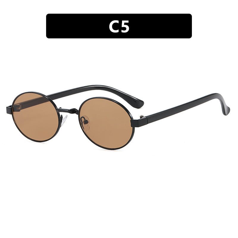 Dame rund brille med elegant metallramme og justerbare nesepads Skanto