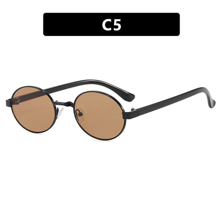 Dame rund brille med elegant metallramme og justerbare nesepads Skanto