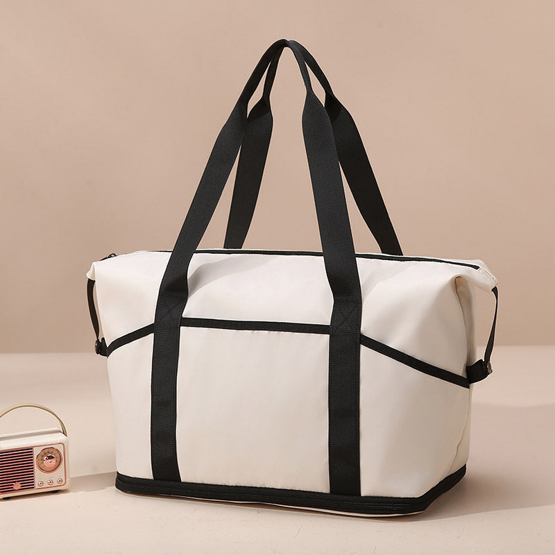 Romslig og funksjonell handlebag Skanto