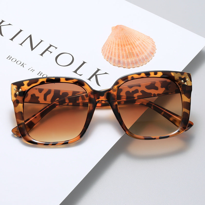 Dame firkantet solbrille med innovativ ramme og UV-beskyttelse Skanto