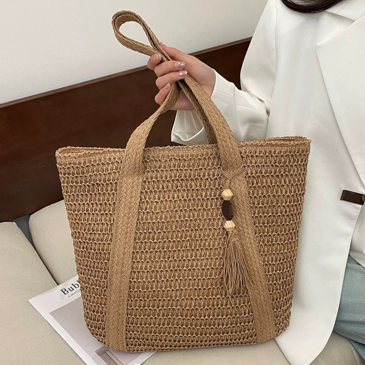 Elegant crossover bag made of braided straw Skanto