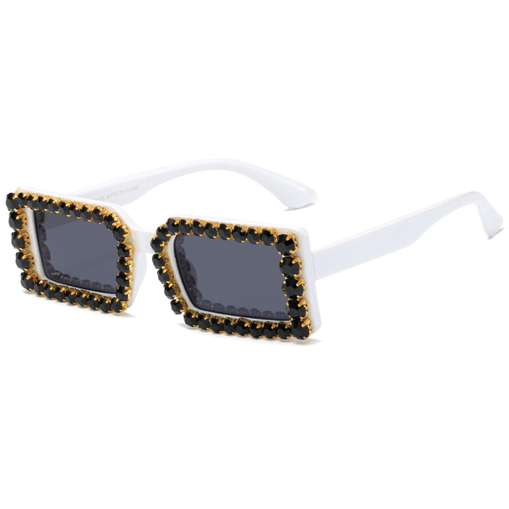 Dame moteriktig solbrille med glitrende rammedekorasjon Skanto