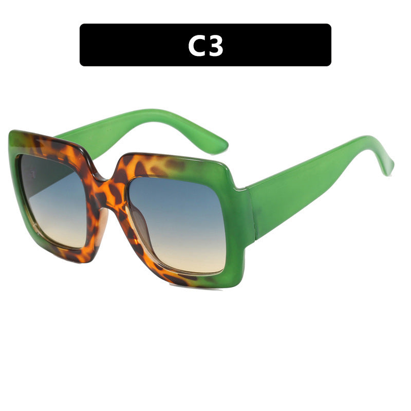 Dame oversized kvadratisk solbrille med markant skjoldpatt-design Skanto
