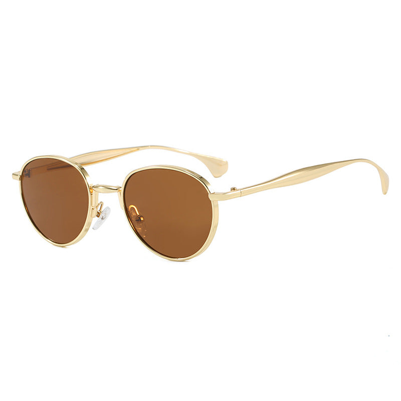 Dame runde solbriller med elegant metallramme og UV-beskyttelse Skanto