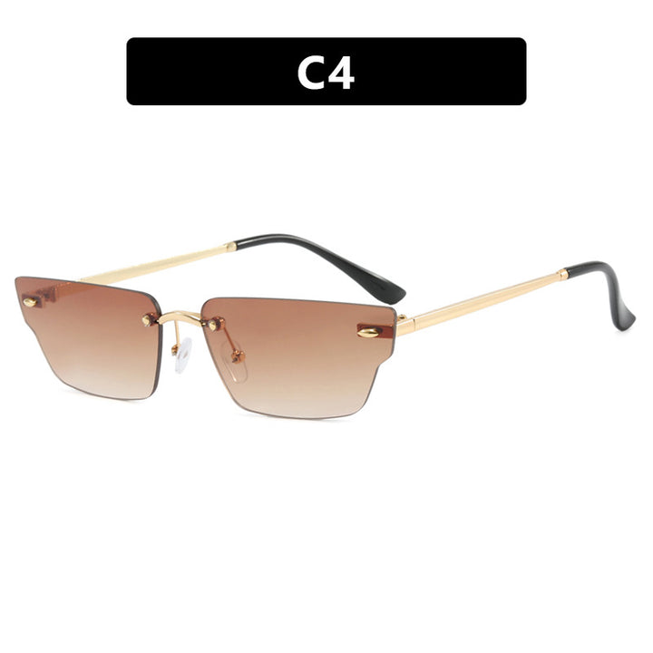 Dame geometrisk solbrille med filigranramme og transparente glass Skanto