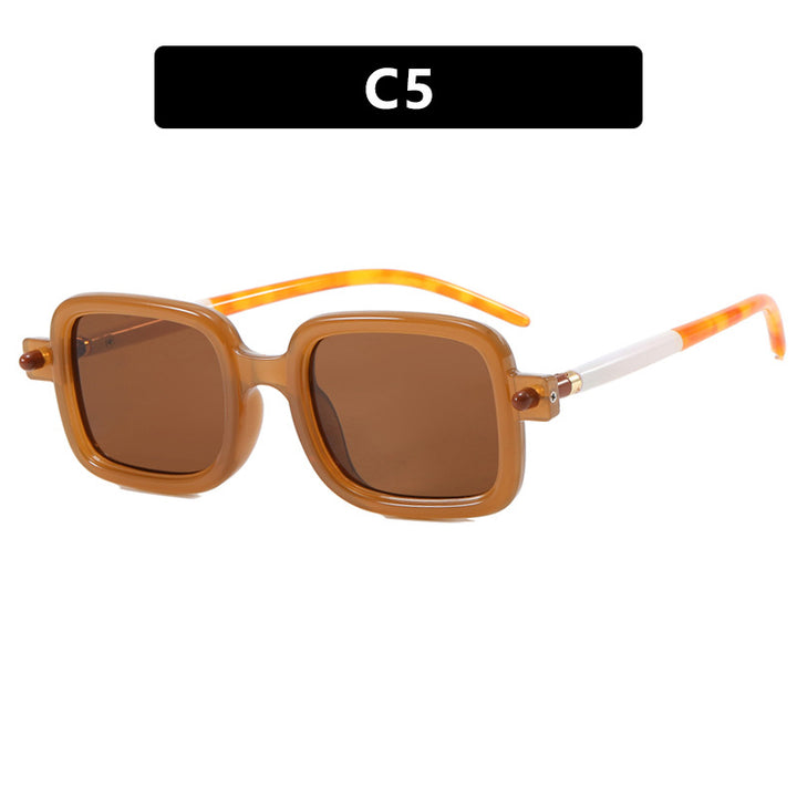 Dame kvadratisk solbrille med iøynefallende og moderne design Skanto