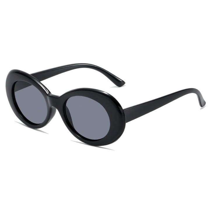 Dame retro-inspirerte solbriller med en elegant, oval ramme Skanto