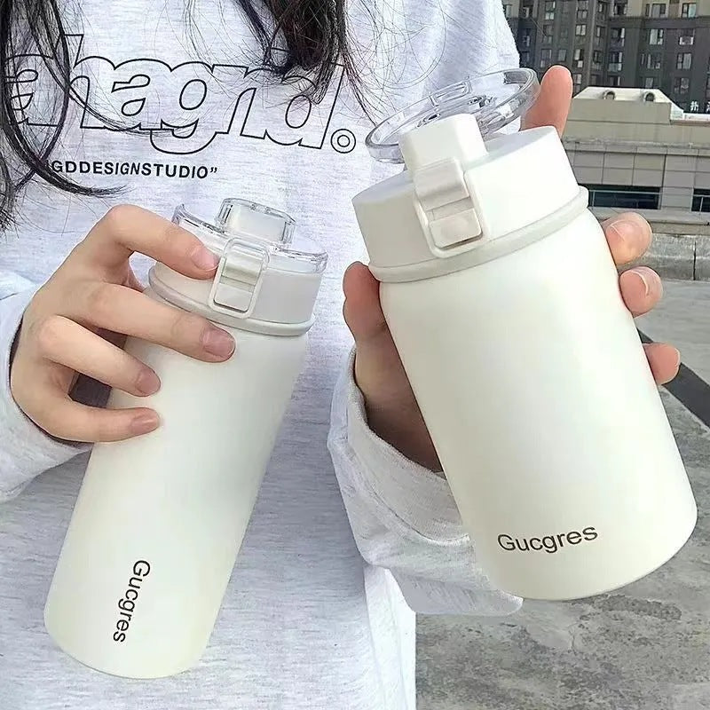 Damen-Isolierflasche mit praktischem Klappverschluss und ergonomischem Design Skanto