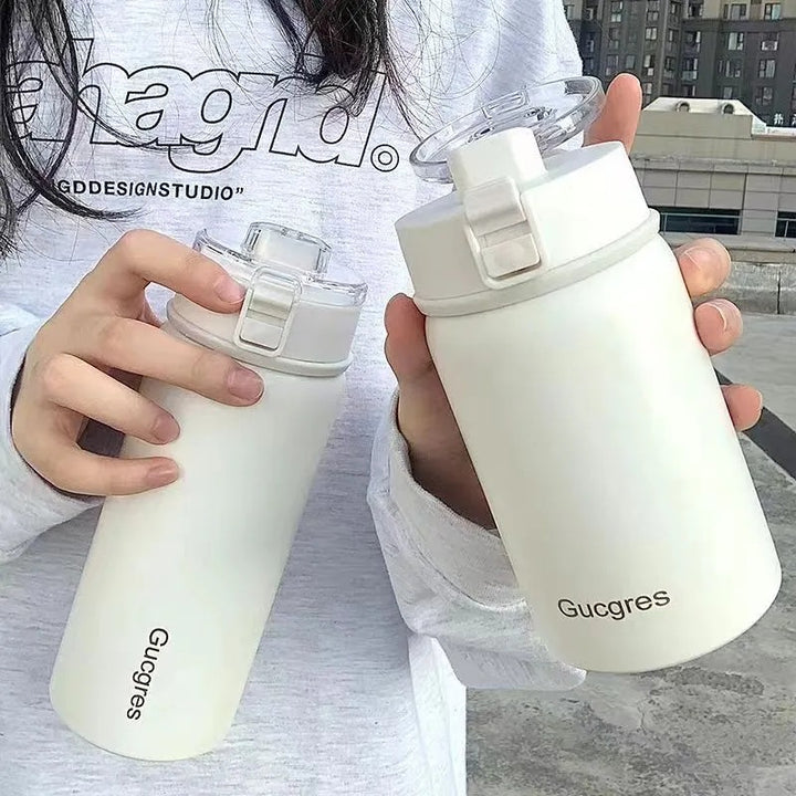 Damen-Isolierflasche mit praktischem Klappverschluss und ergonomischem Design Skanto