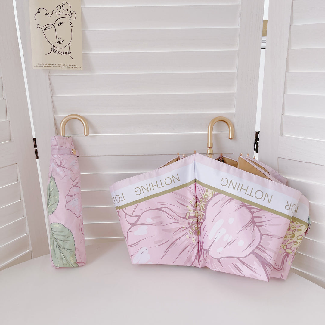 Dame sammenleggbart paraply med elegant hjerte-design Skanto