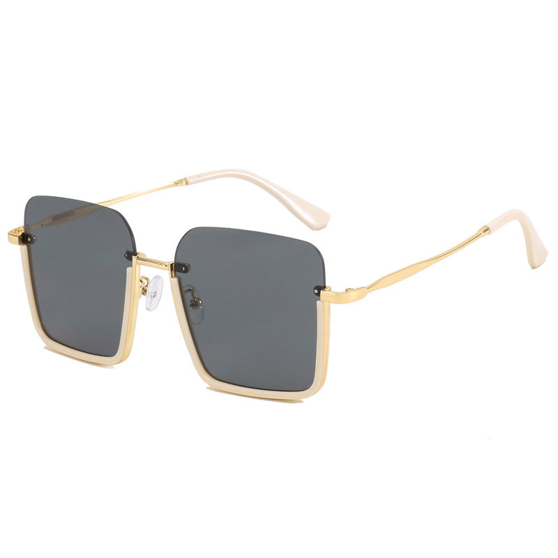 Dame oversized solbrille med elegant geometrisk ramme Skanto