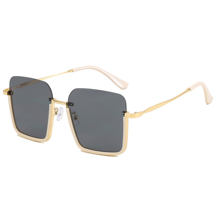 Dame oversized solbrille med elegant geometrisk ramme Skanto