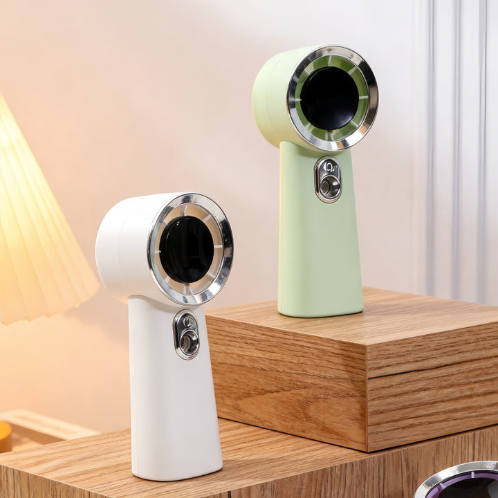 Dame bærbar mini sprayvifte med ergonomisk design Skanto