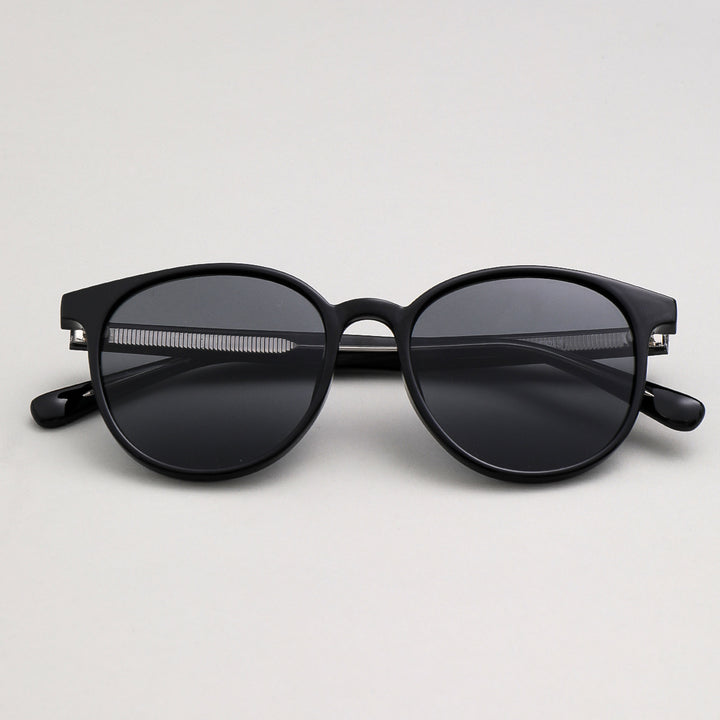 Dame moterik solbrille i elegant, rund design med UV-beskyttelse Skanto
