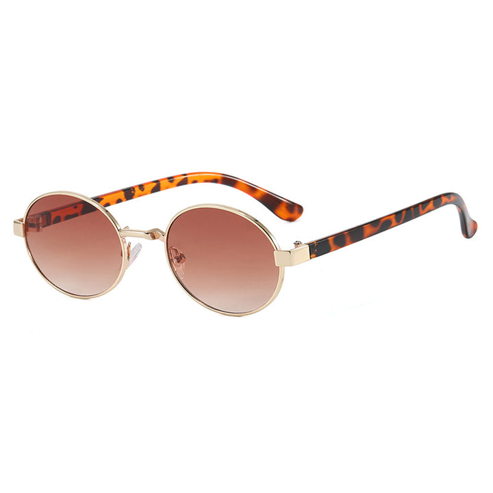 Dame rund brille med elegant metallramme og justerbare nesepads Skanto