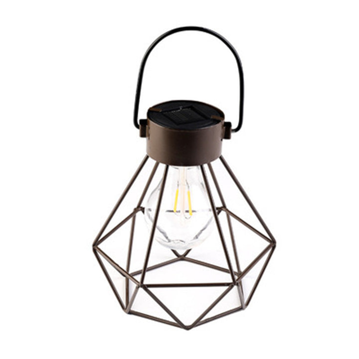 Solarlampe med intrikate mandala utskjæringer og varm LED spotlight Skanto