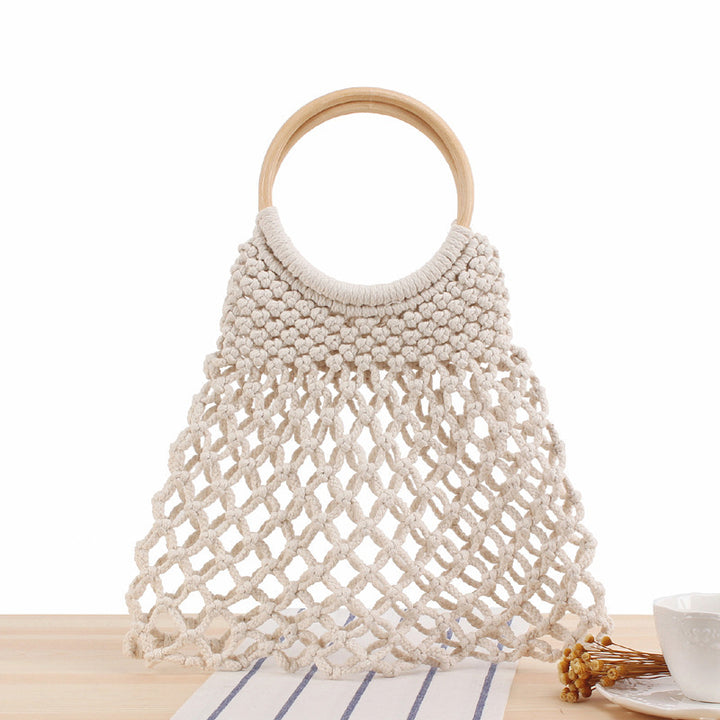 Handbag with artistic mesh design Skanto