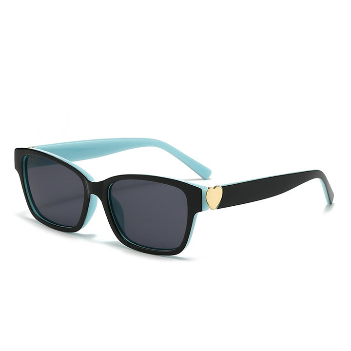 Dame moterik kvadratisk solbrille med hjerte-senter Skanto