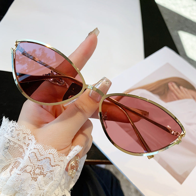 Dame Cat-Eye solbriller med elegant metallramme og UV-beskyttelse Skanto