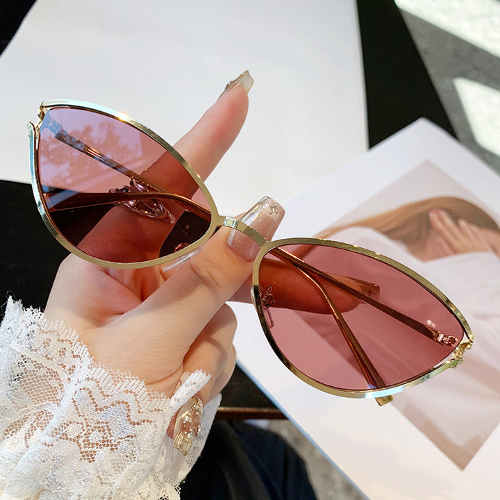 Dame Cat-Eye solbriller med elegant metallramme og UV-beskyttelse Skanto