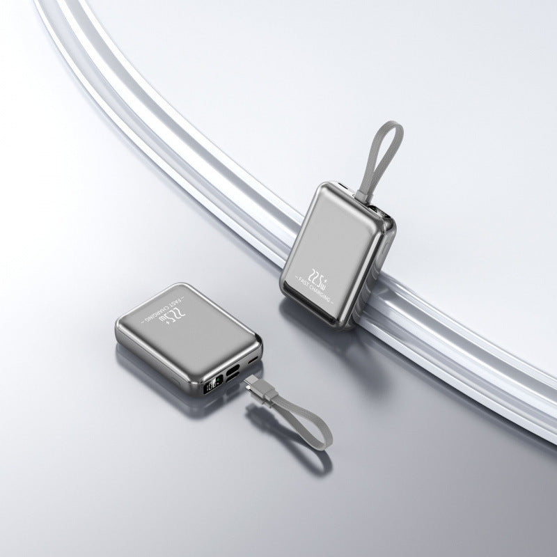 Bærbar powerbank med kompakt design og innebygd hurtiglading Skanto