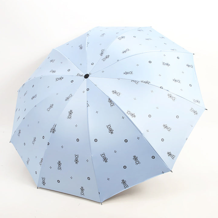 Kvinnes lekne og fargerike paraply Skanto