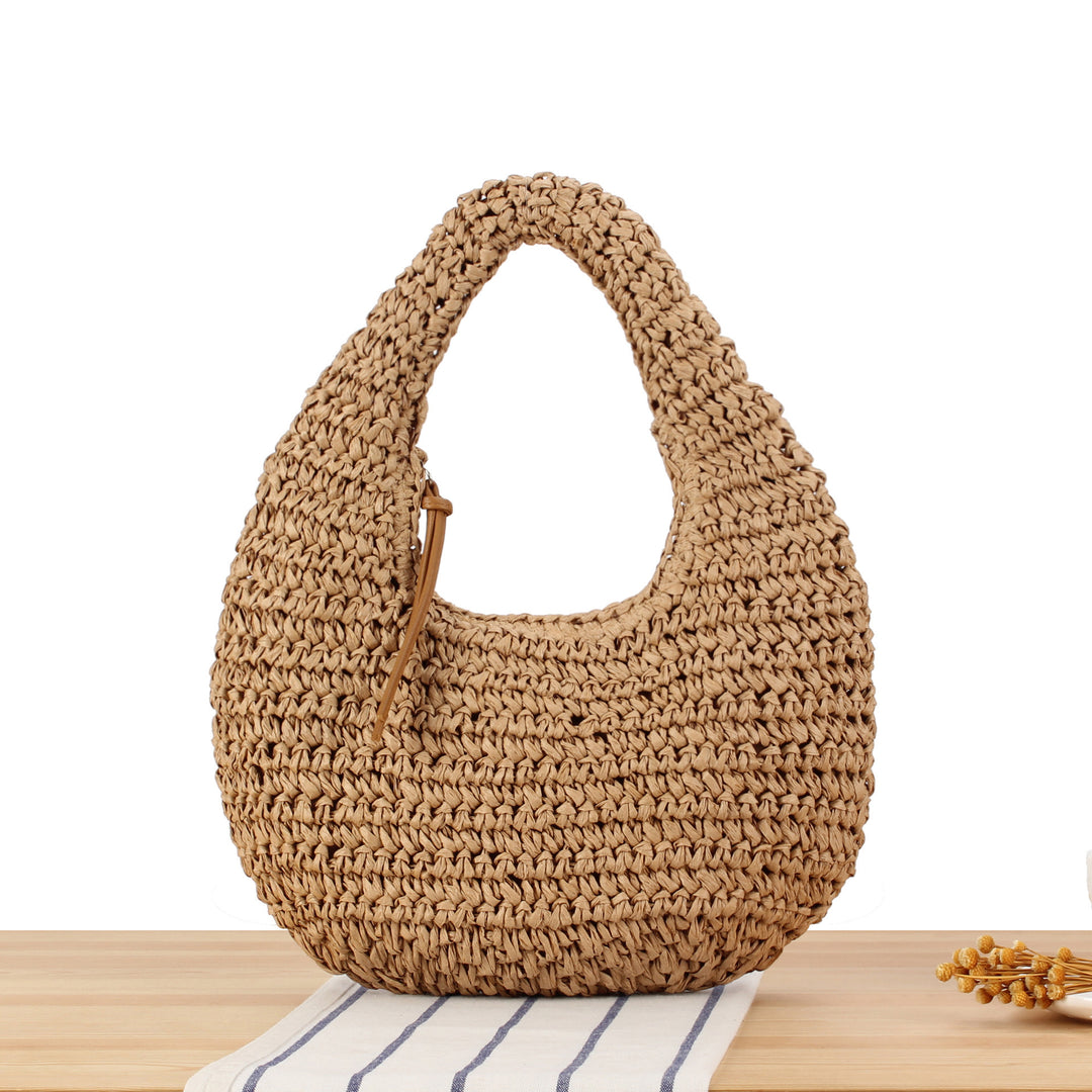 Hand-knotted shoulder bag in natural material Skanto