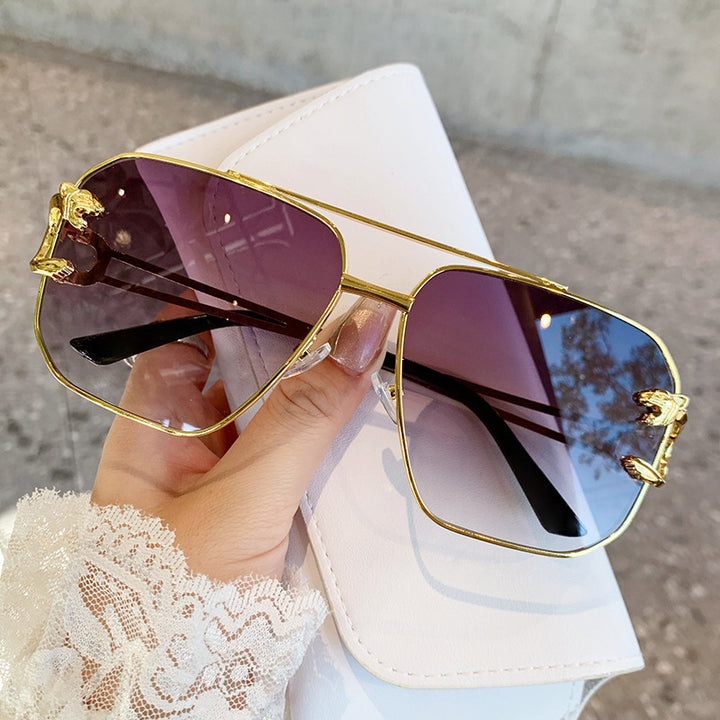 Dame Couture solbrille i elegant geometrisk design Skanto