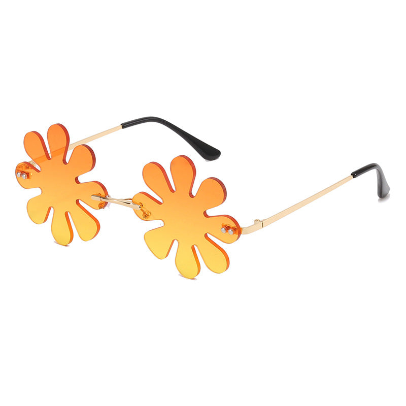 Dame Lekker blomster-solkors med stilfull metallramme Skanto